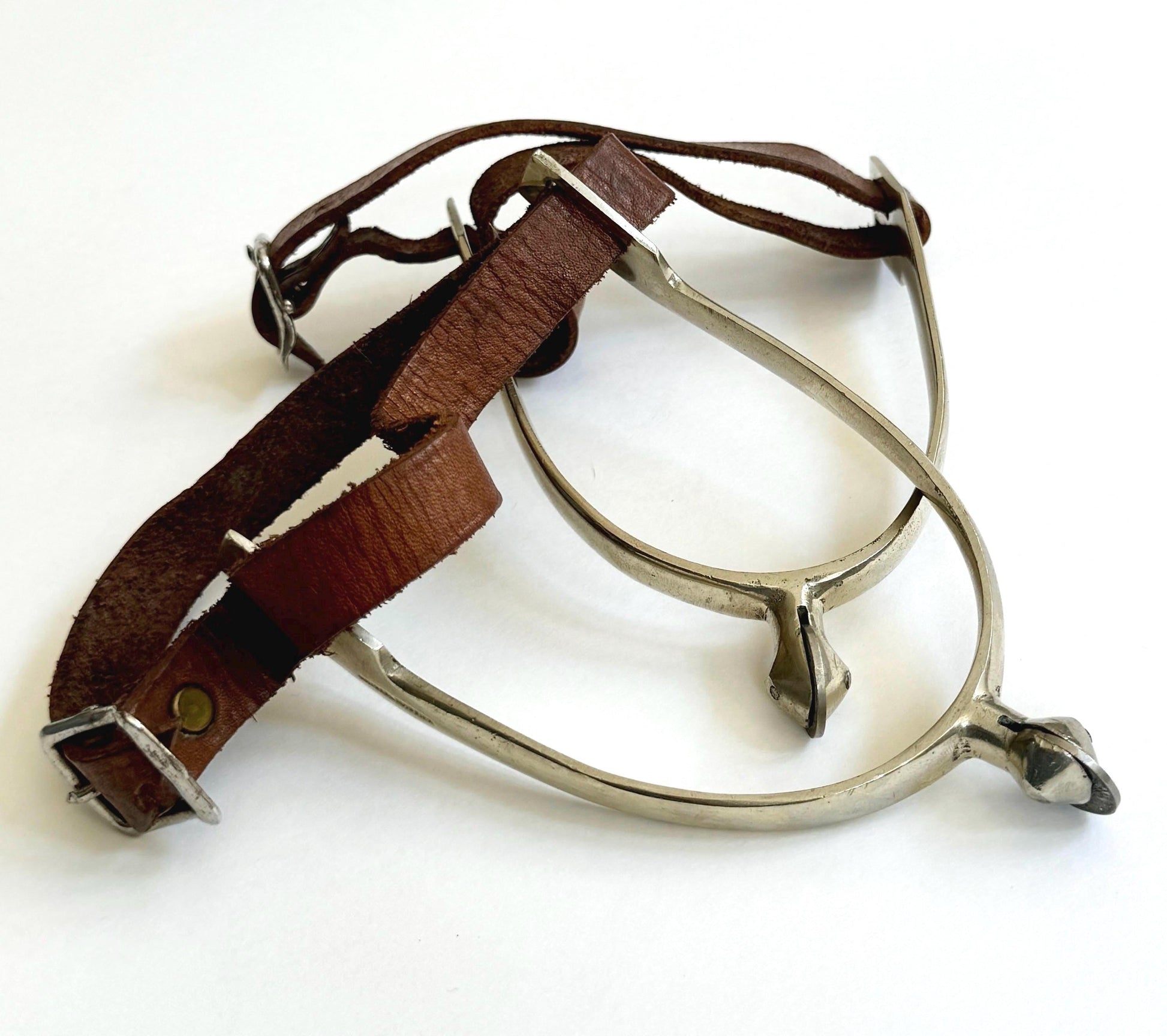 Vintage Nickel Spurs: Worn Leather Straps, Equestrian Ranch Decor